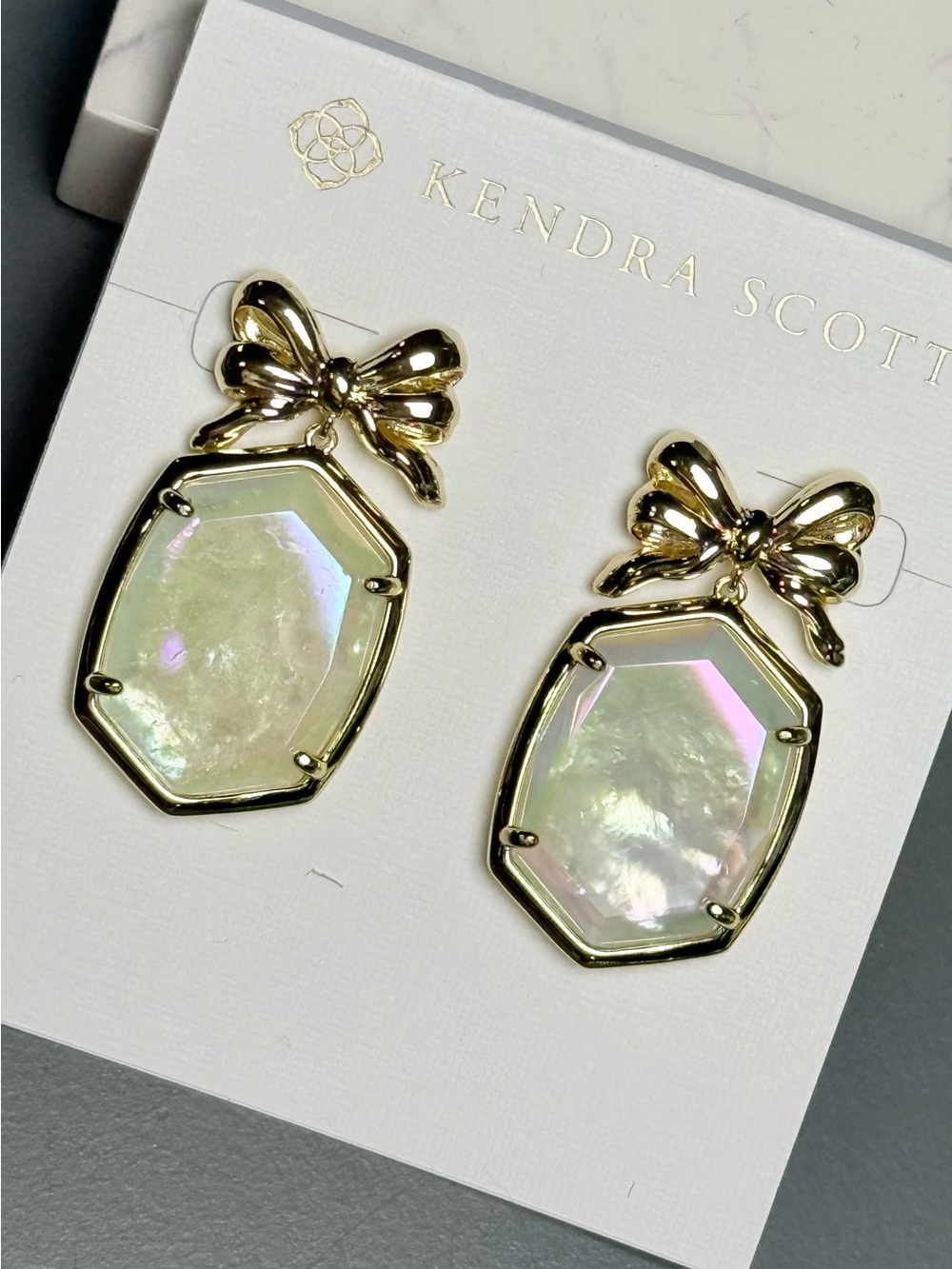Kendra Scott Daphne Gold Bow Earrings in Iridescent Crystal Ivory Illusion - Picture 1 of 3